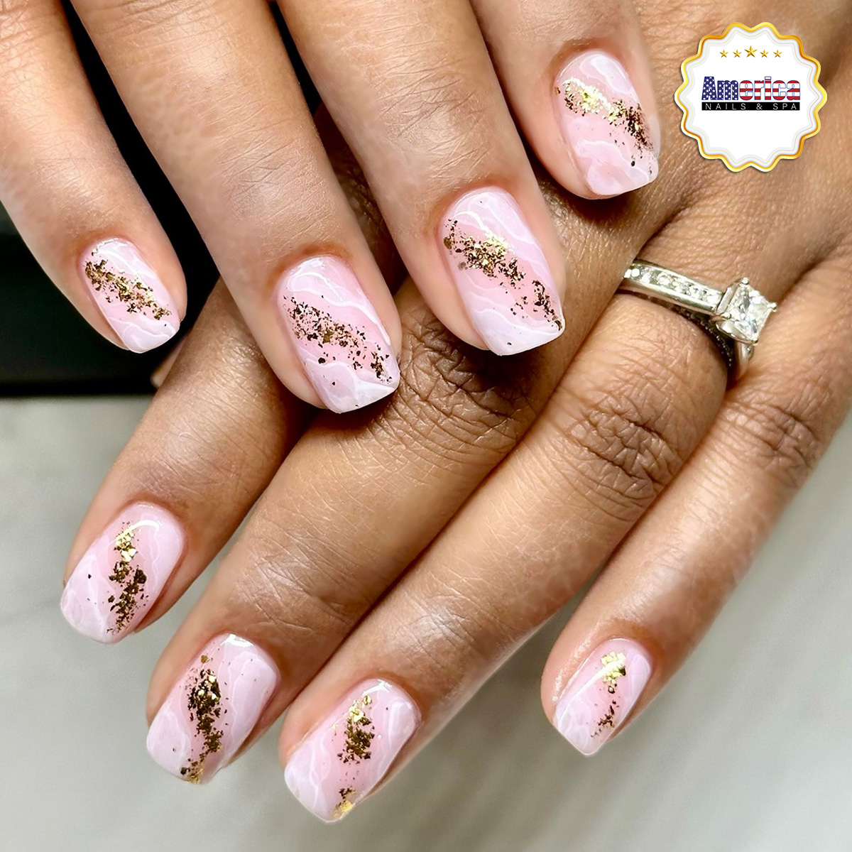 America Nails & Spa logo